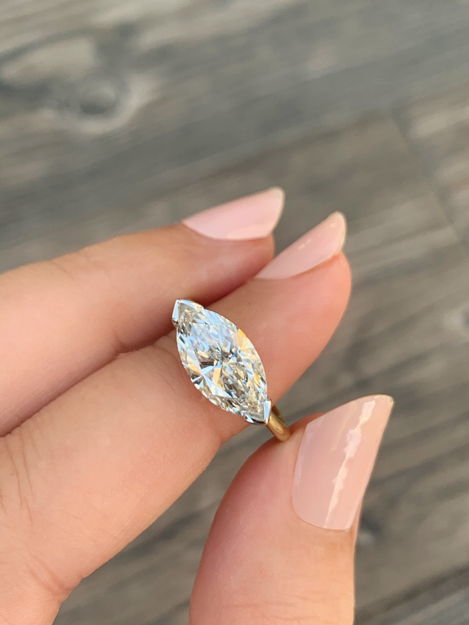 East west store setting engagement ring