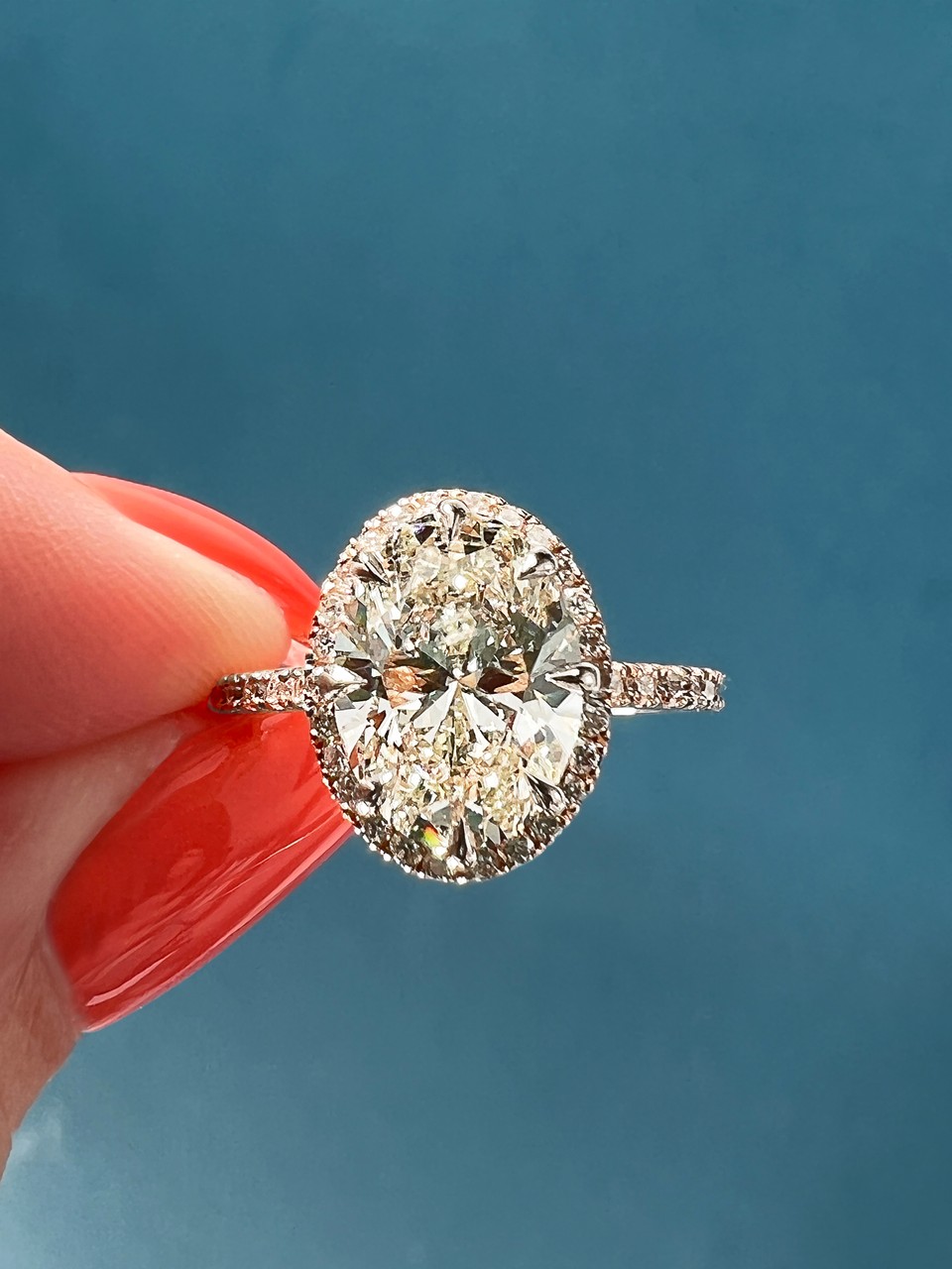 oval natural diamond halo ring