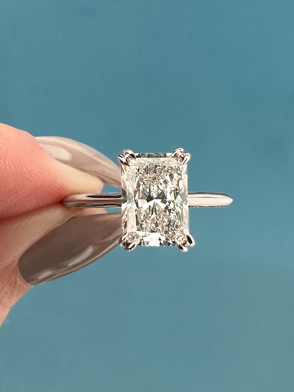 Extended cushion clearance cut diamond