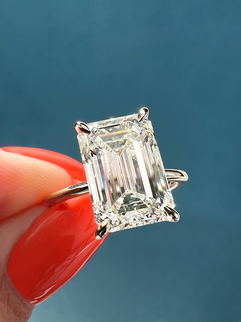 emerald cut diamond solitaire ring